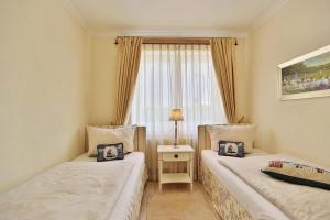 Giường trong phòng chung tại Villa Seestern Villa Seestern Appartement 3