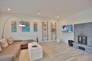 Posezení v ubytování Ferienhaus Glockenstraße Ferienwohnung Ostseehöhe Appartement 1