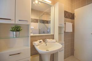 Koupelna v ubytování Ferienhaus Glockenstraße Ferienwohnung Ostseehöhe Appartement 1