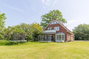 Zahrada ubytování Ferienhaus Glockenstraße Ferienwohnung Ostseehöhe Appartement 1