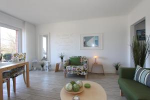 Posezení v ubytování Haus an der Strandallee 112 Haus an der Strandallee 112 Appartement 7