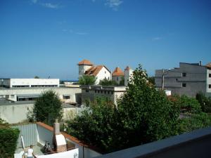 a view of a city with buildings and trees at Villa Favorita in Eforie Sud