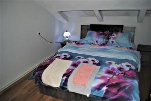 Postel nebo postele na pokoji v ubytování Family Guesthouse - MACHARASHVILI