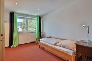 Una cama o camas en una habitación de Ferienhaus Gorch-Fock-Str 37 Ferienhaus Gorch-Fock-Str 37