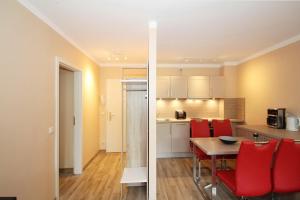 Kuchyň nebo kuchyňský kout v ubytování Wohnpark am Mühlenteich Wohnpark am Mühlenteich Appartement 07