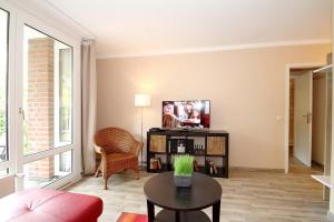 Posezení v ubytování Wohnpark am Mühlenteich Wohnpark am Mühlenteich Appartement 07