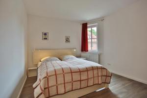 Ліжко або ліжка в номері Haus Ostseeallee Ostseeallee Appartement 56
