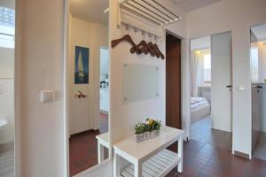 Postel nebo postele na pokoji v ubytování Doppelhaushälfte Am Knurrhahn Am Knurrhahn Appartement 2