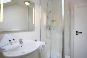 Koupelna v ubytování Doppelhaushälfte Am Knurrhahn Am Knurrhahn Appartement 2