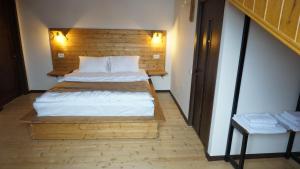 Letto o letti in una camera di Mansarda Kazbegi