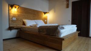 Letto o letti in una camera di Mansarda Kazbegi