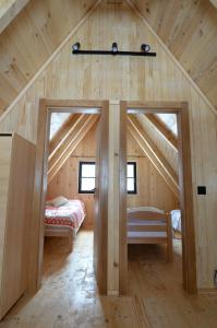 Ένα ή περισσότερα κρεβάτια σε δωμάτιο στο Gorske Vile Jahorina +29 φωτογραφίες