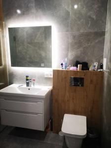 Kúpeľňa v ubytovaní NEW STUDIO in ARCADIA