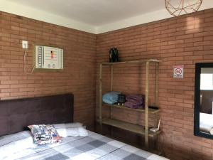 Postel nebo postele na pokoji v ubytování Moradas Brisa da Lagoa