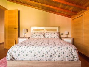Кровать или кровати в номере Patos Beach II - Cies