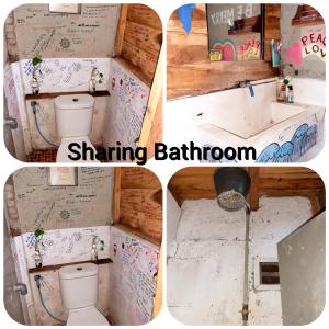 a bathroom with a sink and a toilet with graffiti at Syalala bnb in Timuran