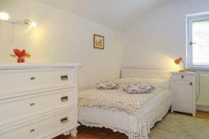 Postel nebo postele na pokoji v ubytování Villa Cujez With Sauna And Pool