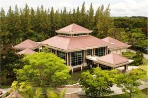 an overhead view of a large building with trees at The Empire Brunei in Bandar Seri Begawan