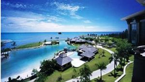 an aerial view of a resort near the water at The Empire Brunei in Bandar Seri Begawan