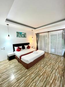 Khaosok Good view Resort - SHA PLUS客房内的一张或多张床位