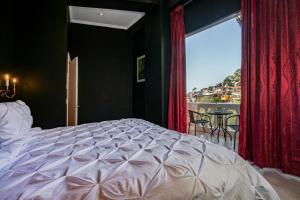 Postel nebo postele na pokoji v ubytování Hotel Boutique Rivera Del Rio