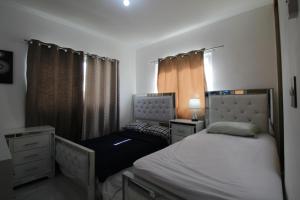 Postel nebo postele na pokoji v ubytování Beautiful private residence