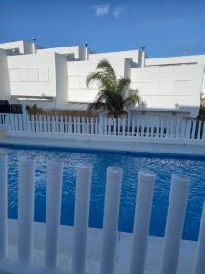 The swimming pool at or close to A Levante Conil- Solo familias y parejas