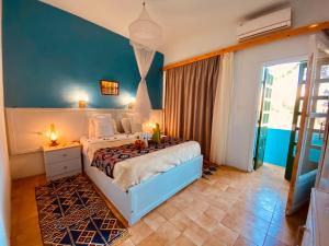 Postel nebo postele na pokoji v ubytování El Gezira Hotel