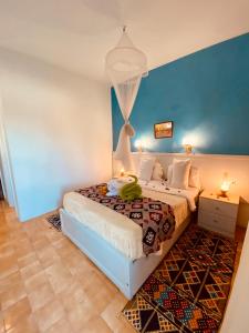 Postel nebo postele na pokoji v ubytování El Gezira Hotel