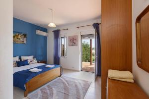 Posteľ alebo postele v izbe v ubytovaní Pigi Paradise Residence