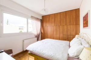Postel nebo postele na pokoji v ubytování City apartment Mall center