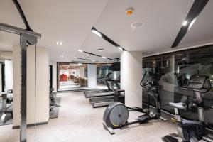 a gym with treadmills and elliptical machines at Travelodge Phuket Town in Phuket +48 photos