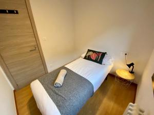 Llit o llits en una habitació de PROBER_LES BONS