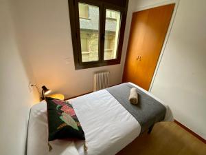 Llit o llits en una habitació de PROBER_LES BONS