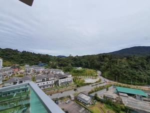 arial view of a city with mountains in the background at Paradise Penthouse 5 bedrooms 5 bathrooms in Tanah Rata