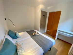 Llit o llits en una habitació de PROBER_LES BONS