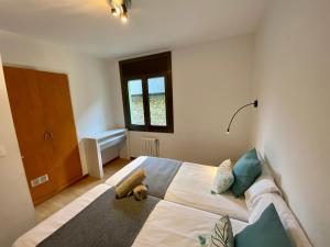 Llit o llits en una habitació de PROBER_LES BONS