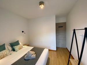 Llit o llits en una habitació de PROBER_LES BONS