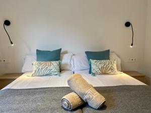 Llit o llits en una habitació de PROBER_LES BONS