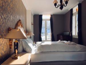 Rúm í herbergi á Historisches Hotel Bären