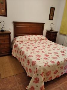 Postel nebo postele na pokoji v ubytování Casa Rural el Maestro II