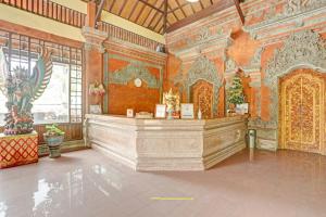 The lobby or reception area at Collection O 90805 Aditya Beach Resort And Spa