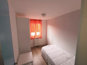 Postel nebo postele na pokoji v ubytování L'Ecoliere