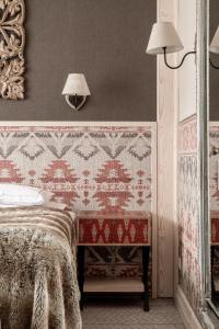 Posteľ alebo postele v izbe v ubytovaní Aries Hotel & SPA Zakopane