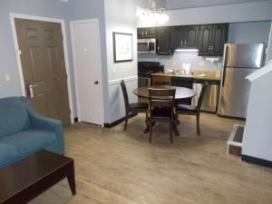 A kitchen or kitchenette at SureStay Studio by Best Western Pensacola