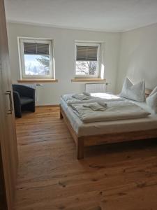 Łóżko lub łóżka w pokoju w obiekcie Premium Appartements Di Bora