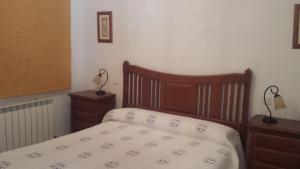 Postel nebo postele na pokoji v ubytování Casa Rural el Maestro II