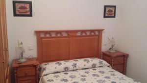 Postel nebo postele na pokoji v ubytování Casa Rural el Maestro II