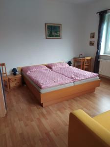 Postel nebo postele na pokoji v ubytování penzion Poutník