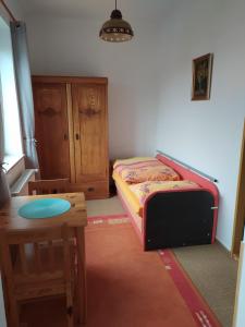 Postel nebo postele na pokoji v ubytování penzion Poutník